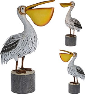 HAGEDYR PELIKAN PÅ STUBBE